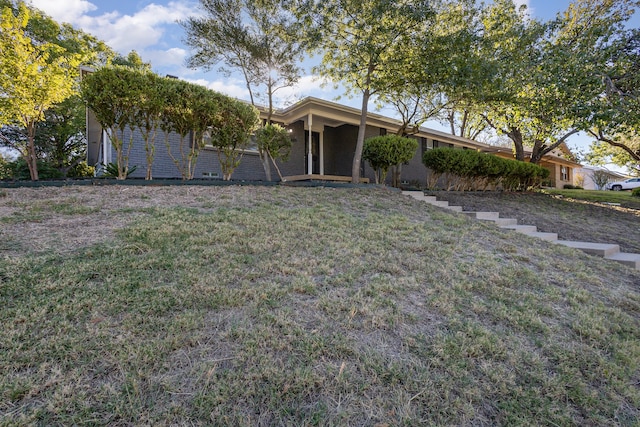 view of front of home with a front yard