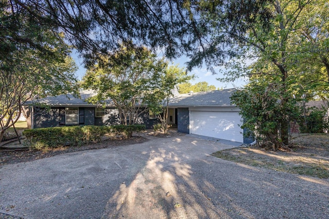 509 Ridgeview Dr, Rockwall, TX 75087 - view of front of home featuring driveway and a garage
