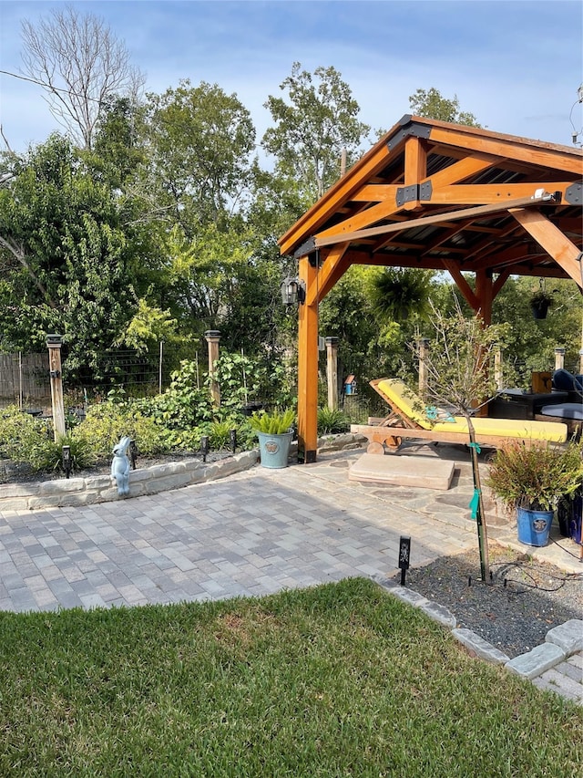 surrounding community featuring a gazebo and a patio