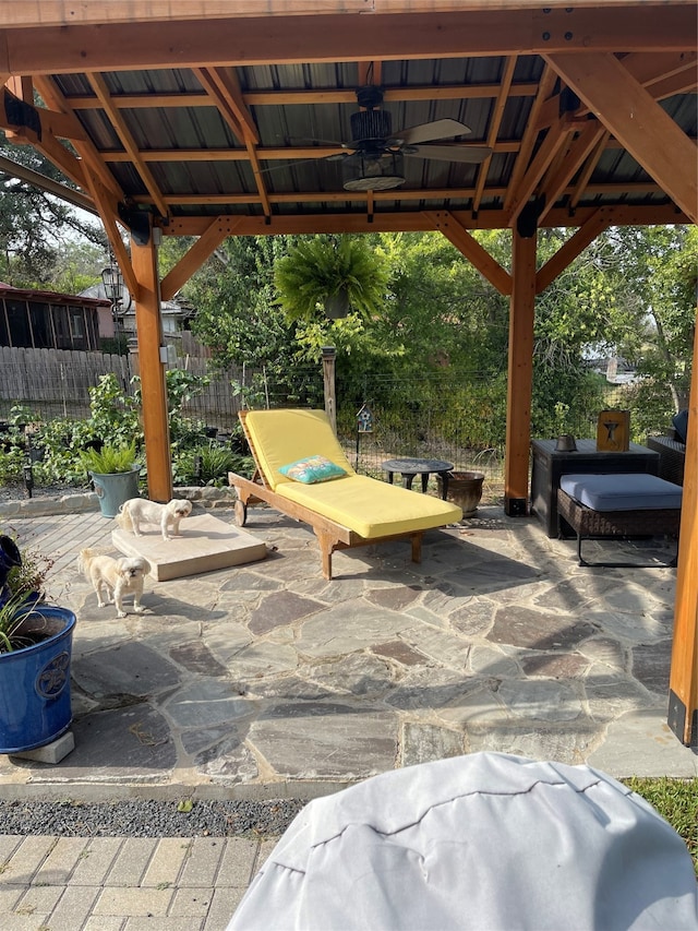 view of patio / terrace featuring a gazebo and ceiling fan