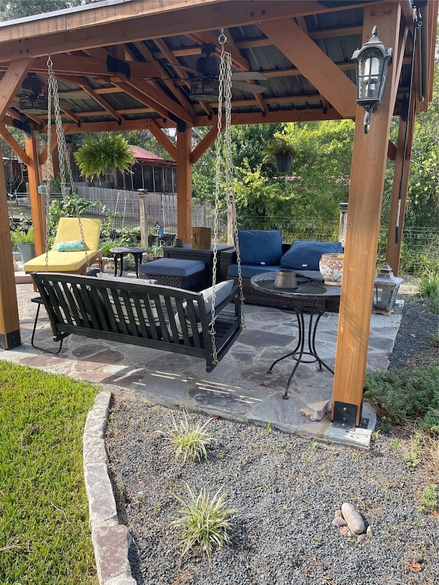 view of patio with outdoor lounge area and a gazebo