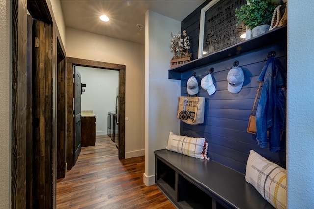 mudroom with dark wood-type flooring