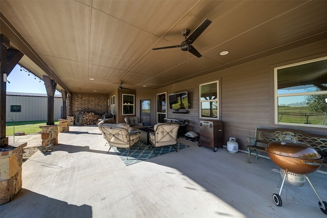 view of patio featuring ceiling fan and an outdoor hangout area