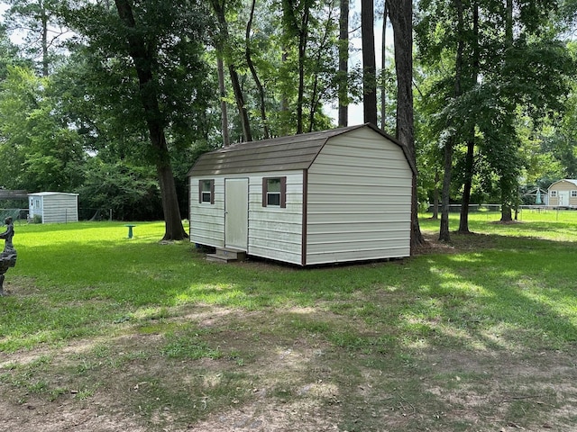 6371 Buncombe Rd, Shreveport, LA 71129 - view of shed with fence