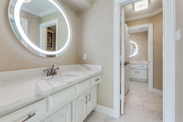 bathroom featuring vanity and crown molding