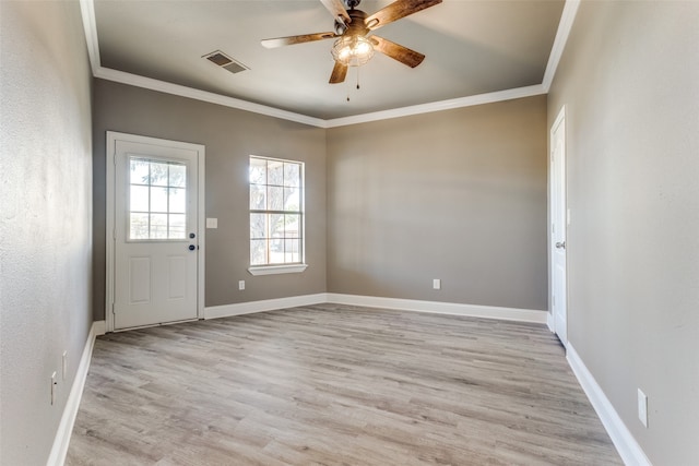 doorway with ceiling fan, ornamental molding, and light hardwood / wood-style flooring