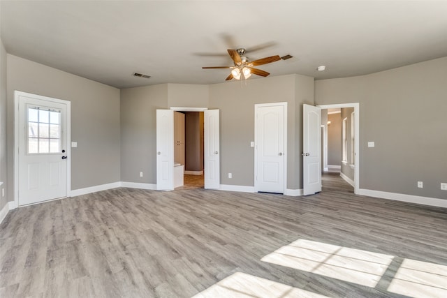 interior space featuring ceiling fan and light hardwood / wood-style flooring