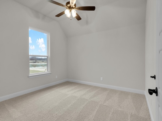 additional living space with vaulted ceiling, carpet floors, and ceiling fan