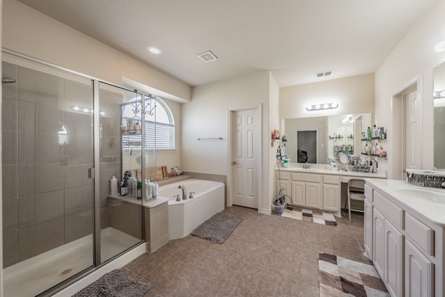 bathroom with vanity, plus walk in shower, and tile patterned flooring