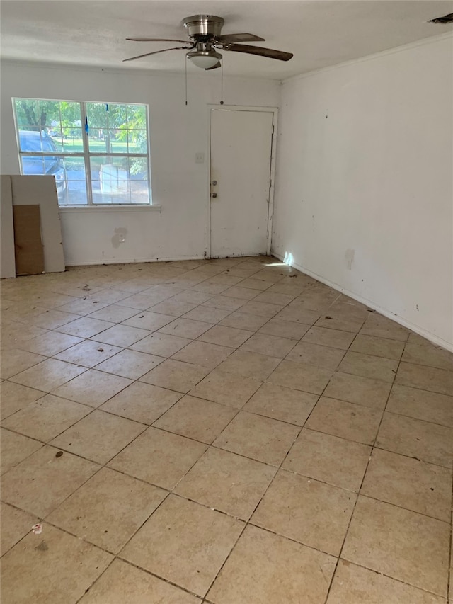 unfurnished room featuring ceiling fan