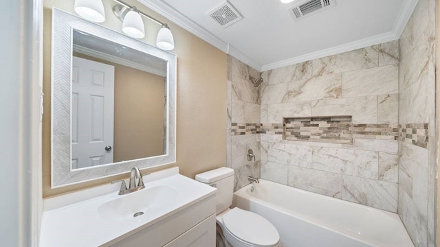 full bathroom with toilet, crown molding, and tiled shower / bath