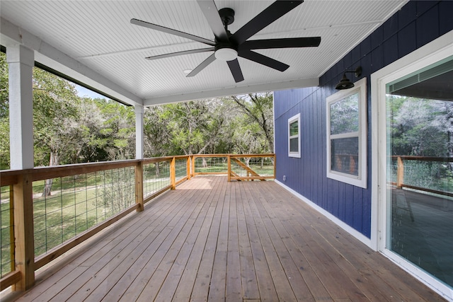 wooden terrace featuring ceiling fan