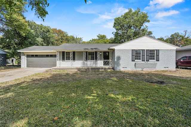 single story home featuring a garage, covered porch, and a front lawn