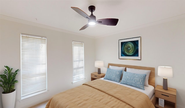 bedroom featuring ceiling fan and crown molding