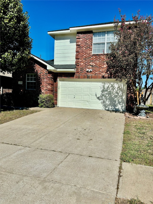 view of side of property with a garage