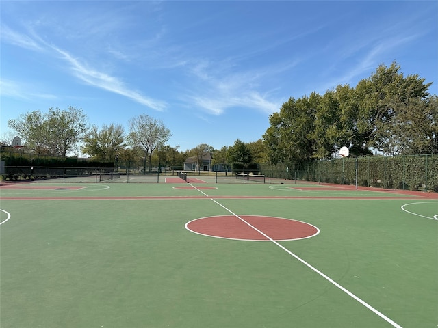 view of basketball court featuring tennis court