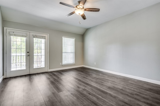 unfurnished room with french doors, ceiling fan, dark wood-type flooring, and lofted ceiling