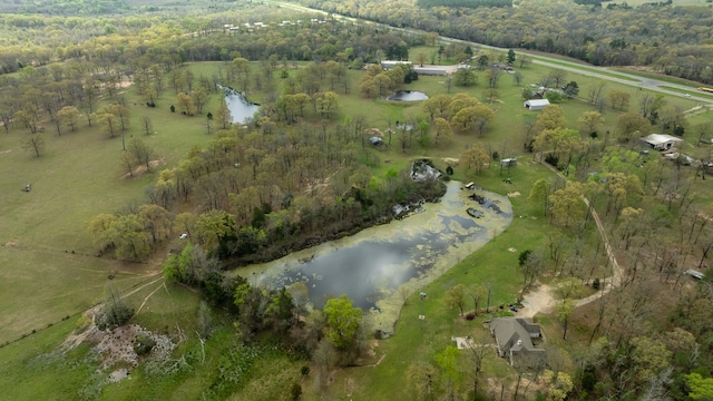 birds eye view of property featuring a water view and a rural view