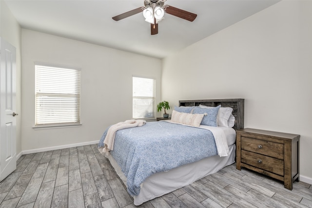 bedroom featuring ceiling fan and light wood-type flooring