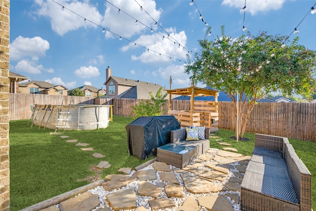 view of patio / terrace featuring a fenced in pool