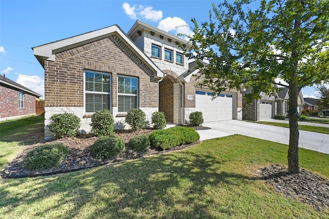 view of front of house featuring a front lawn and a garage