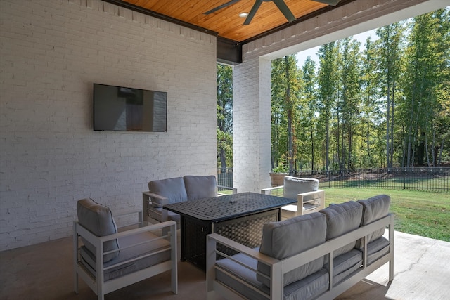 view of patio with outdoor lounge area and ceiling fan