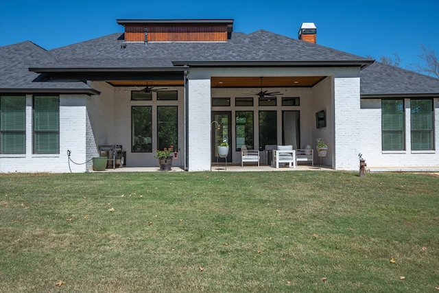 back of house with a patio, a lawn, and ceiling fan