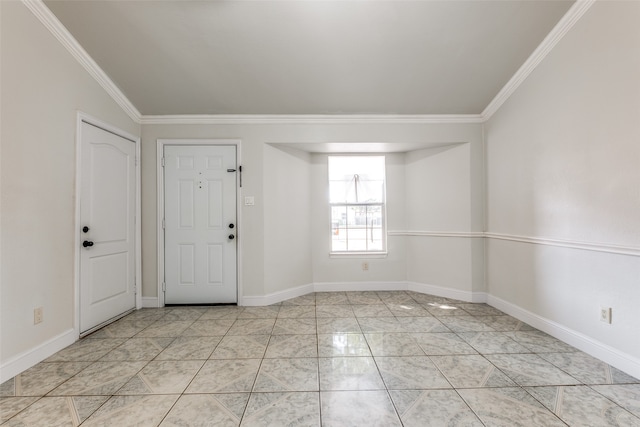 foyer entrance featuring lofted ceiling and crown molding