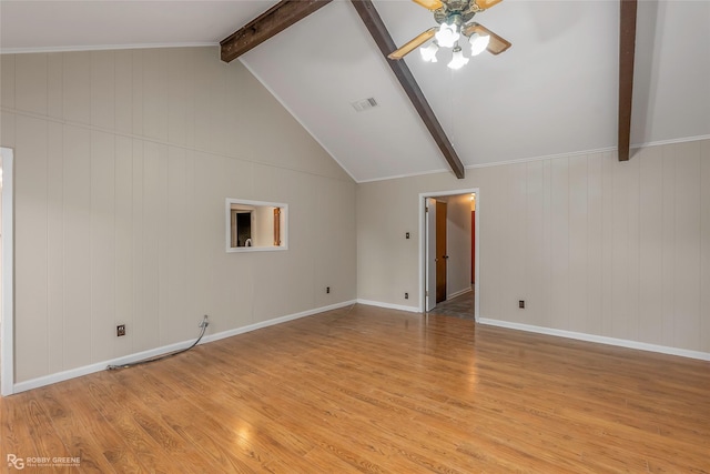 unfurnished living room with visible vents, light wood-style flooring, lofted ceiling with beams, baseboards, and ceiling fan