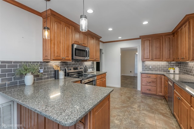 kitchen featuring brown cabinetry, a peninsula, stainless steel appliances, crown molding, and decorative light fixtures