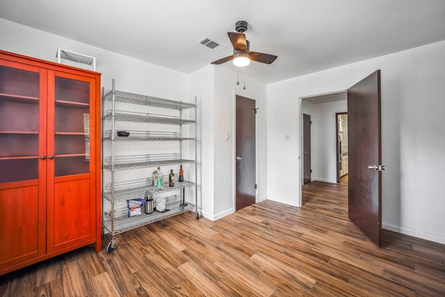 unfurnished room featuring hardwood / wood-style flooring and ceiling fan