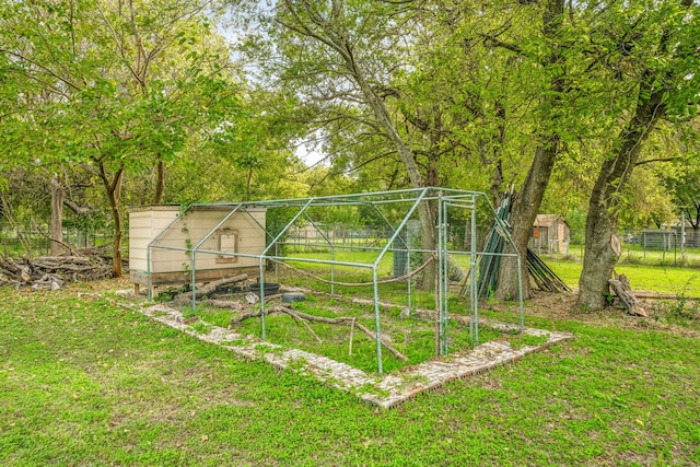 view of outdoor structure featuring a yard