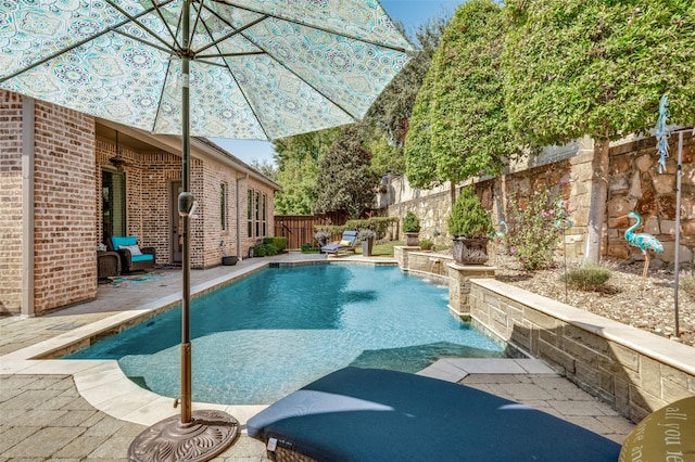 view of swimming pool featuring pool water feature