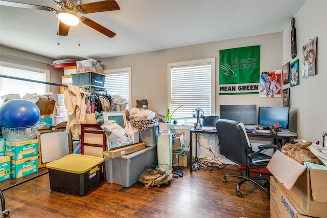 office area with ceiling fan and dark hardwood / wood-style floors