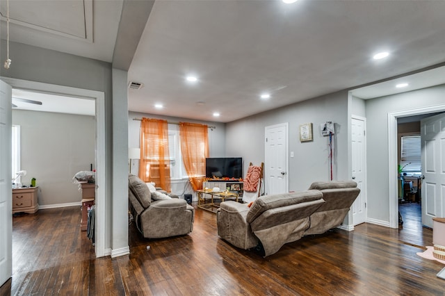 living room featuring dark hardwood / wood-style floors