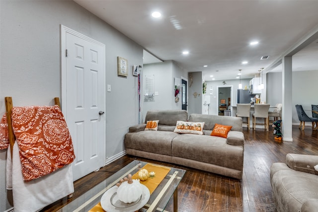 living room featuring dark hardwood / wood-style floors