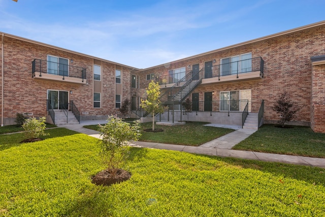 surrounding community featuring a patio and a lawn