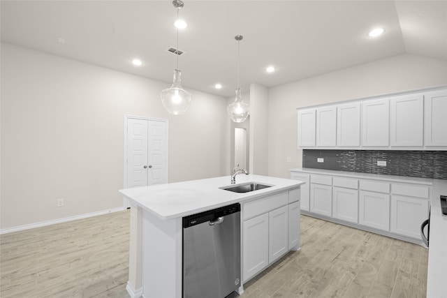 kitchen with sink, a kitchen island with sink, hanging light fixtures, white cabinets, and stainless steel dishwasher