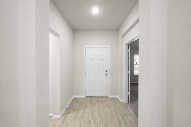 hallway featuring light hardwood / wood-style flooring