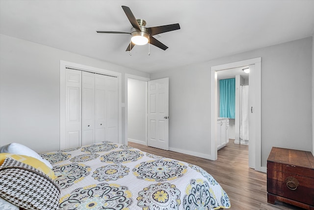 bedroom featuring a closet, ceiling fan, and light hardwood / wood-style floors