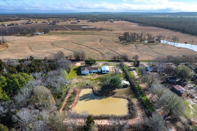 bird's eye view with a water view and a rural view