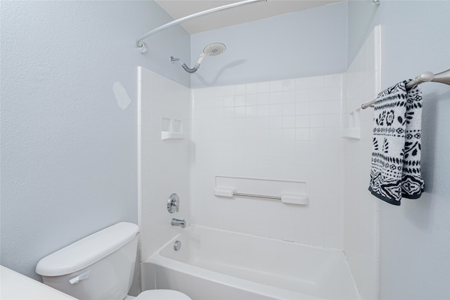 bathroom featuring toilet and tub / shower combination