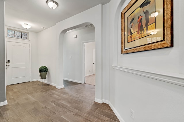 entryway with light hardwood / wood-style flooring