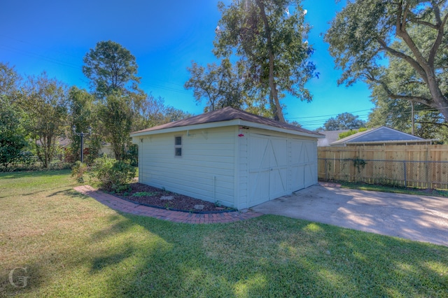 exterior space featuring a shed and a lawn