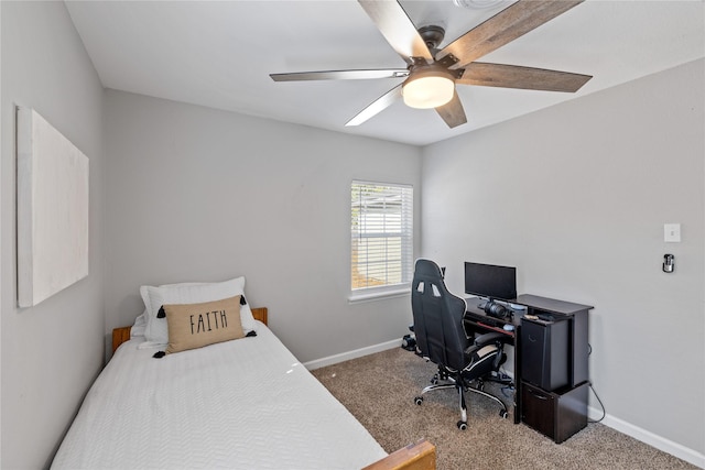 bedroom featuring ceiling fan and light carpet