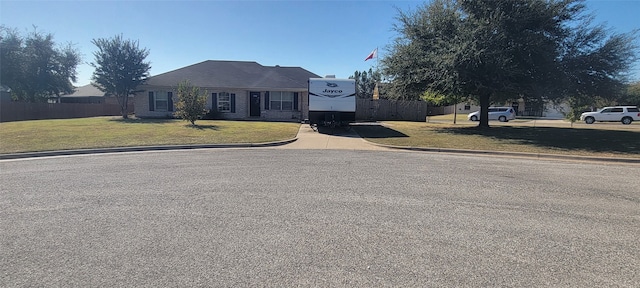 view of front facade with a front yard