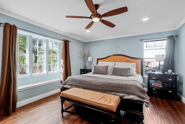 bedroom featuring ceiling fan, wood-type flooring, and ornamental molding