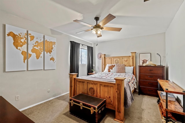 bedroom featuring ceiling fan and light colored carpet