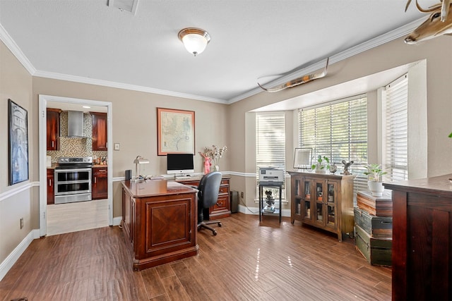 office with hardwood / wood-style floors and crown molding