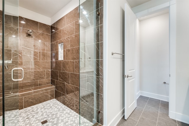 bathroom featuring tile patterned flooring and walk in shower